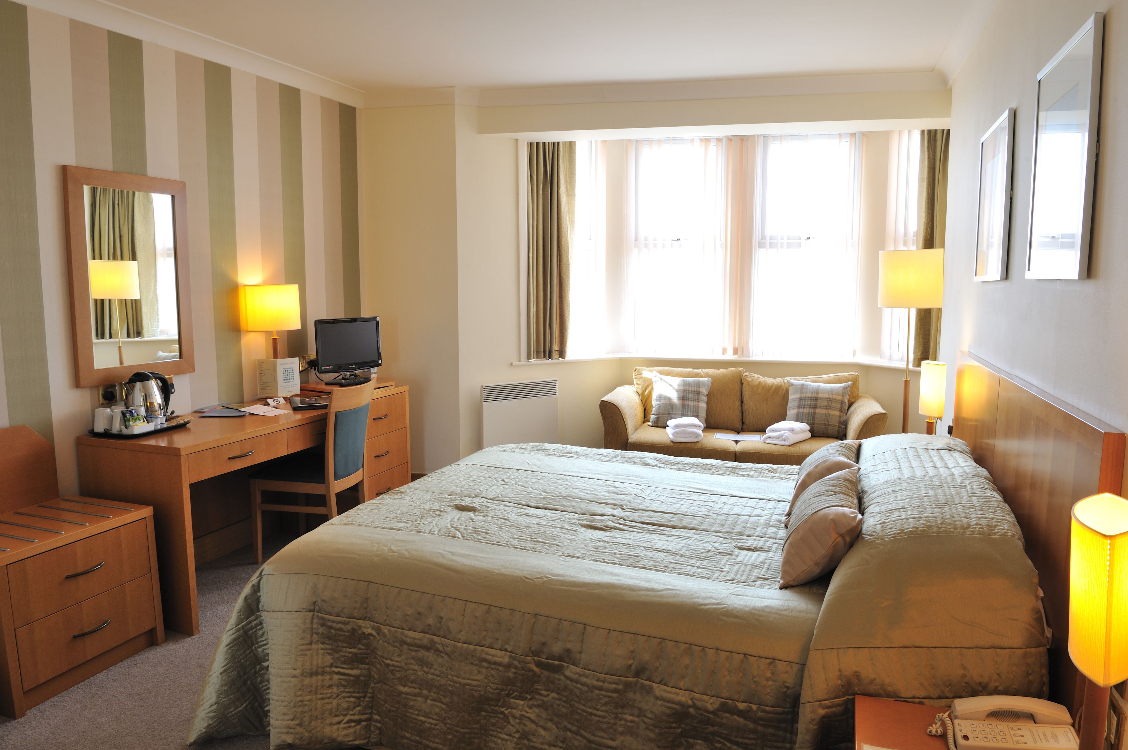 family room, sea view | in-room safe, desk, iron/ironing board, free wifi