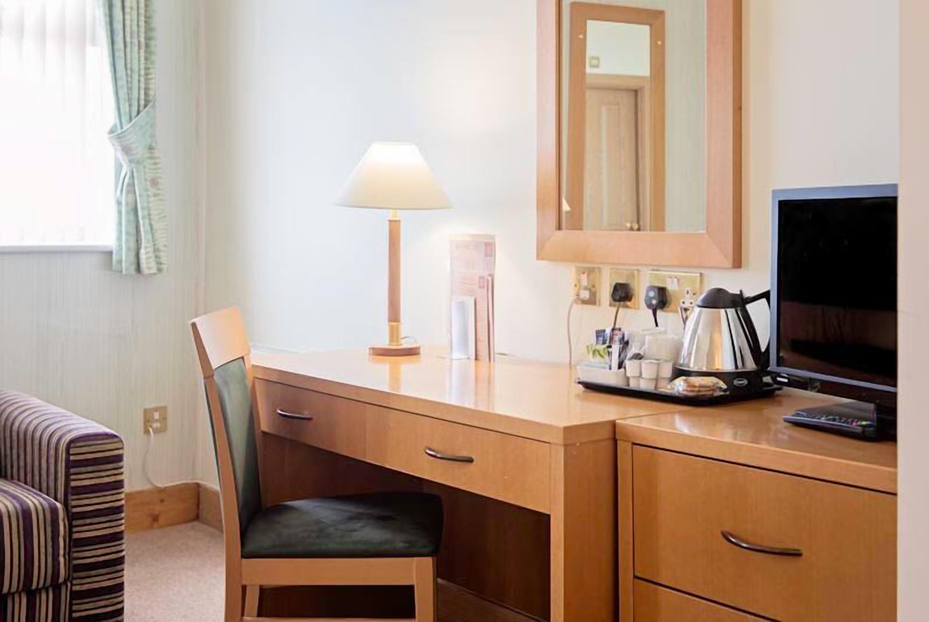 family room, sea view | in-room safe, desk, iron/ironing board, free wifi