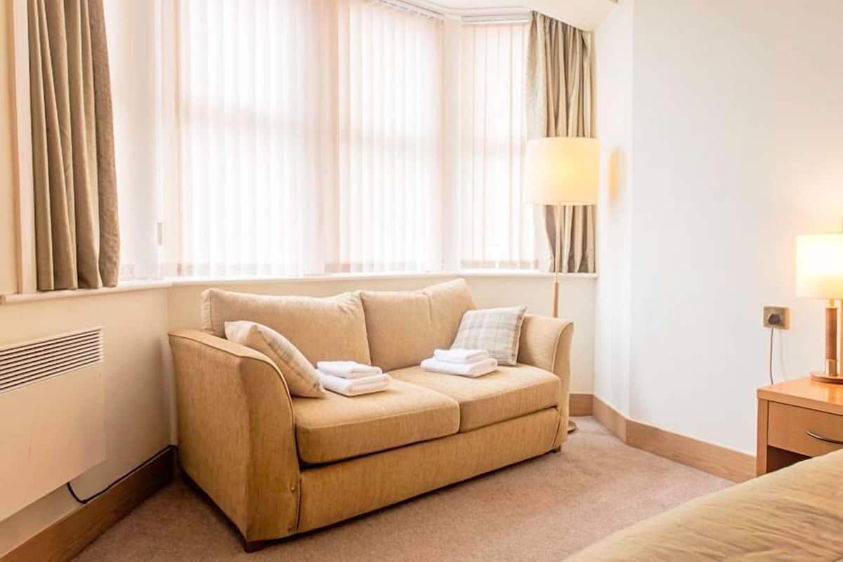 family room, sea view | in-room safe, desk, iron/ironing board, free wifi
