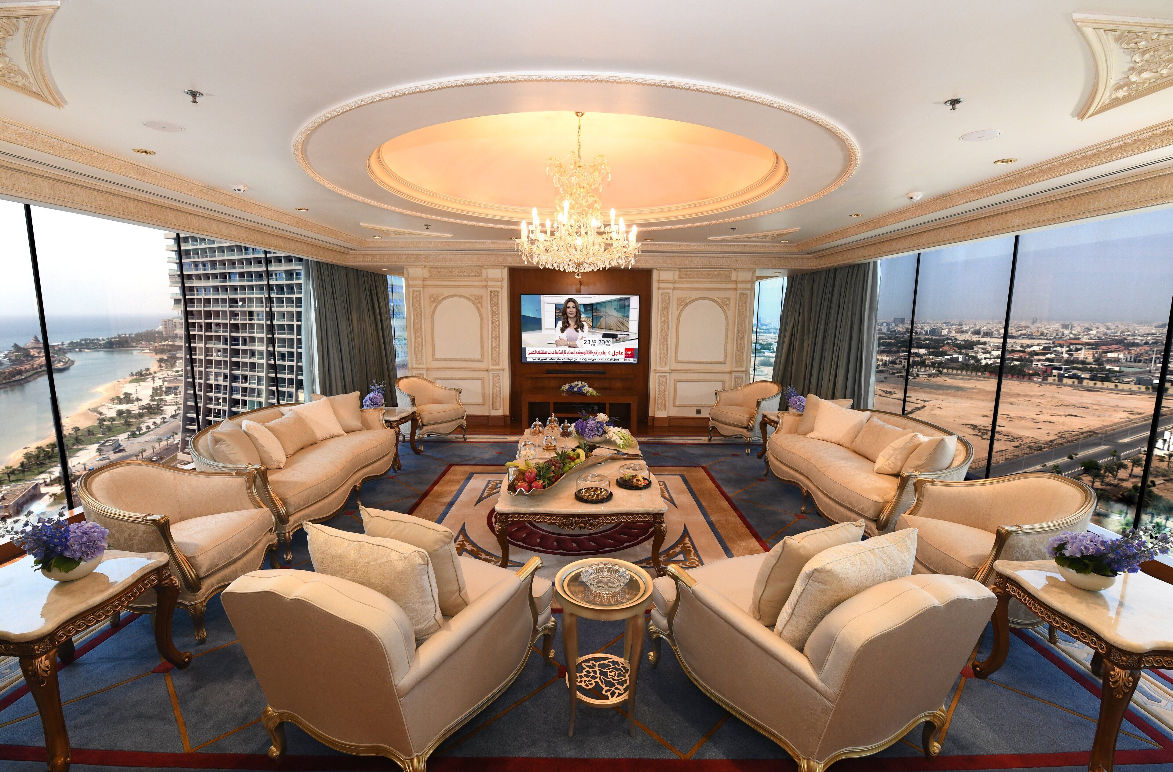 royal suite | living area | led tv, fireplace, dvd player, ipod dock