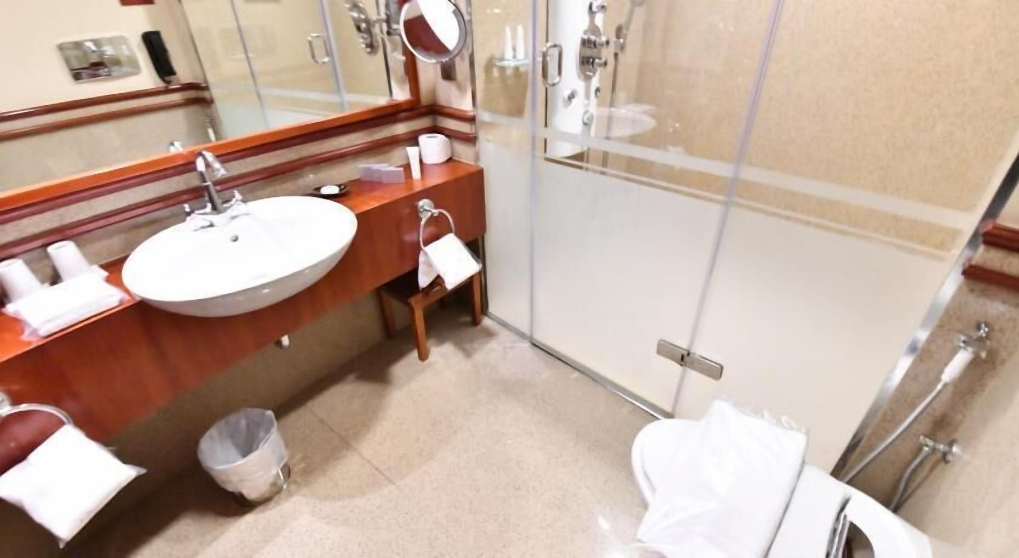 Bathroom | Deep-soaking bathtub, designer toiletries, hair dryer, bathrobes