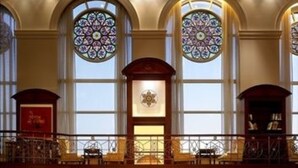 A hotel lobby with a grand staircase, large stained glass windows, and a central chandelier. - ITC Grand Central, a Luxury Collection Hotel, Mumbai (Mumbai)