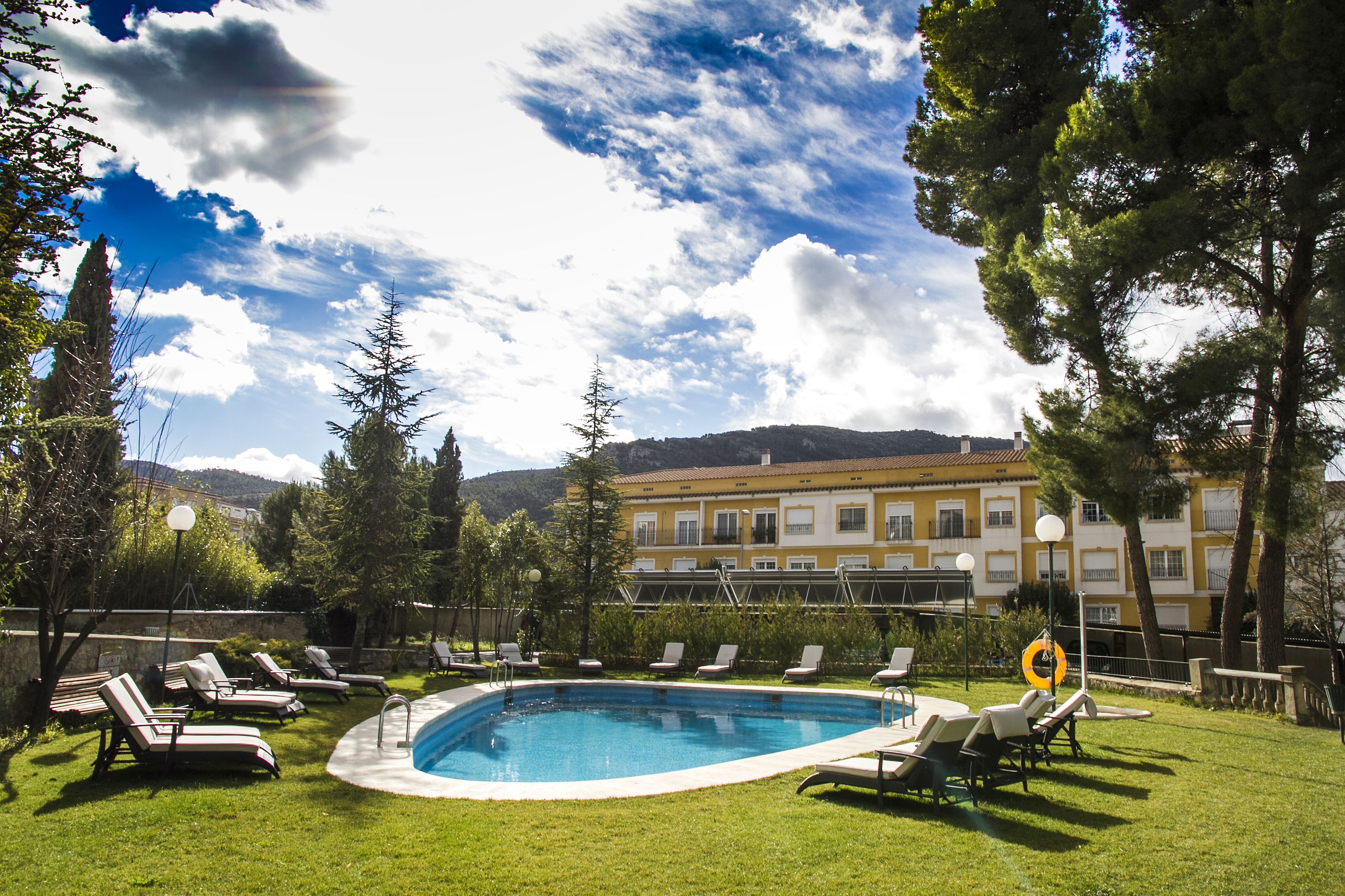 outdoor pool, pool umbrellas, pool loungers