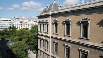A historic building with classical architecture, featuring symmetrical windows and a prominent dome.