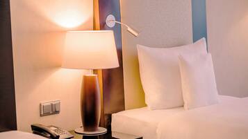 Hypo-allergenic bedding, minibar, in-room safe, desk