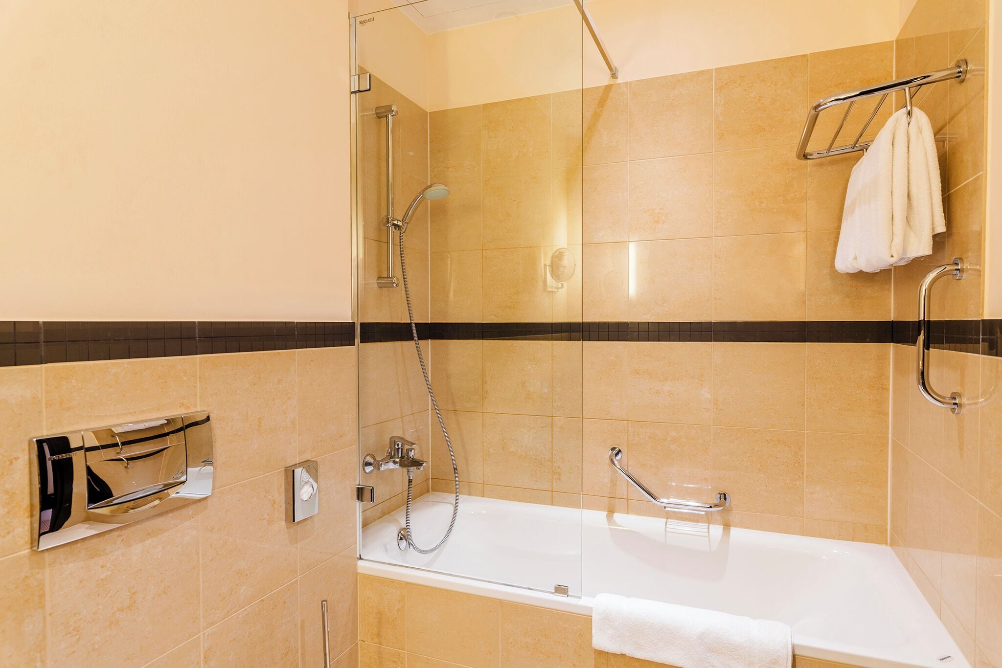 standard twin room | bathroom | combined shower/bathtub, designer toiletries, hair dryer, towels