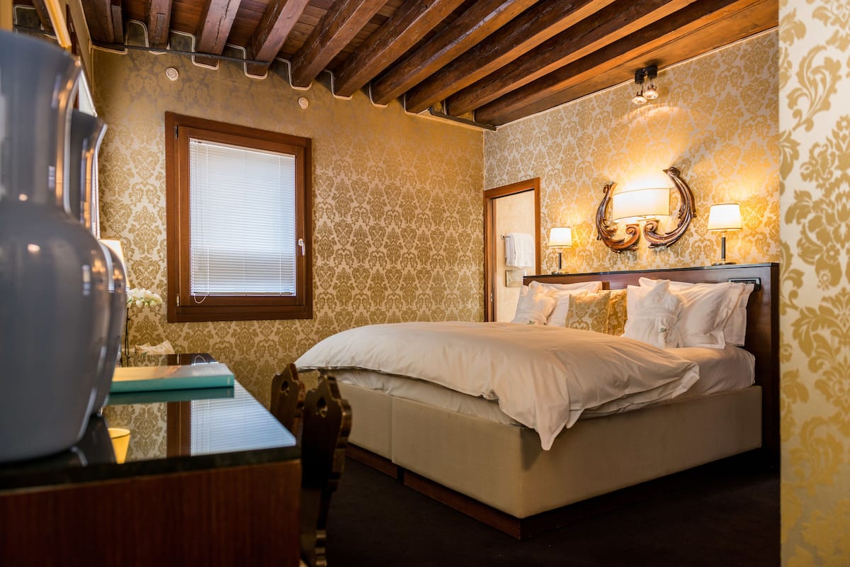Deluxe Double or Twin Room | Down duvets, minibar, in-room safe, individually decorated
