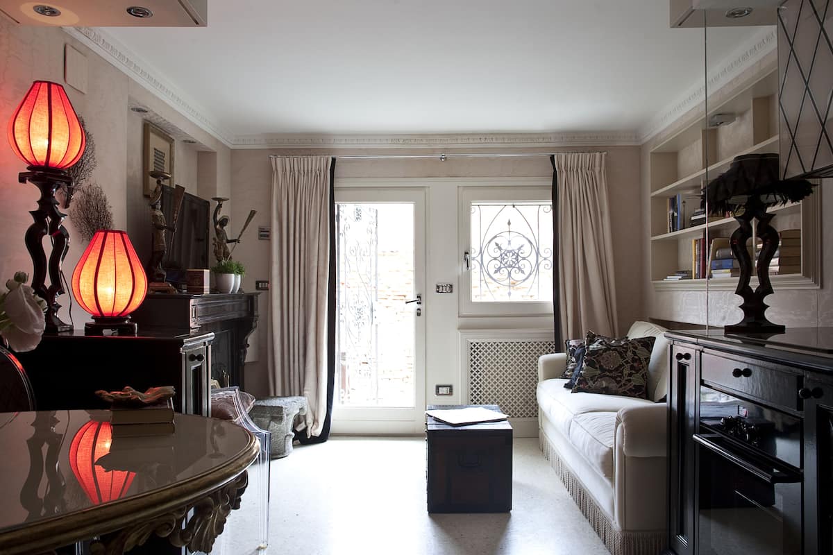 Deluxe Apartment, 1 Bedroom | Living area | 40-inch LED TV with digital channels