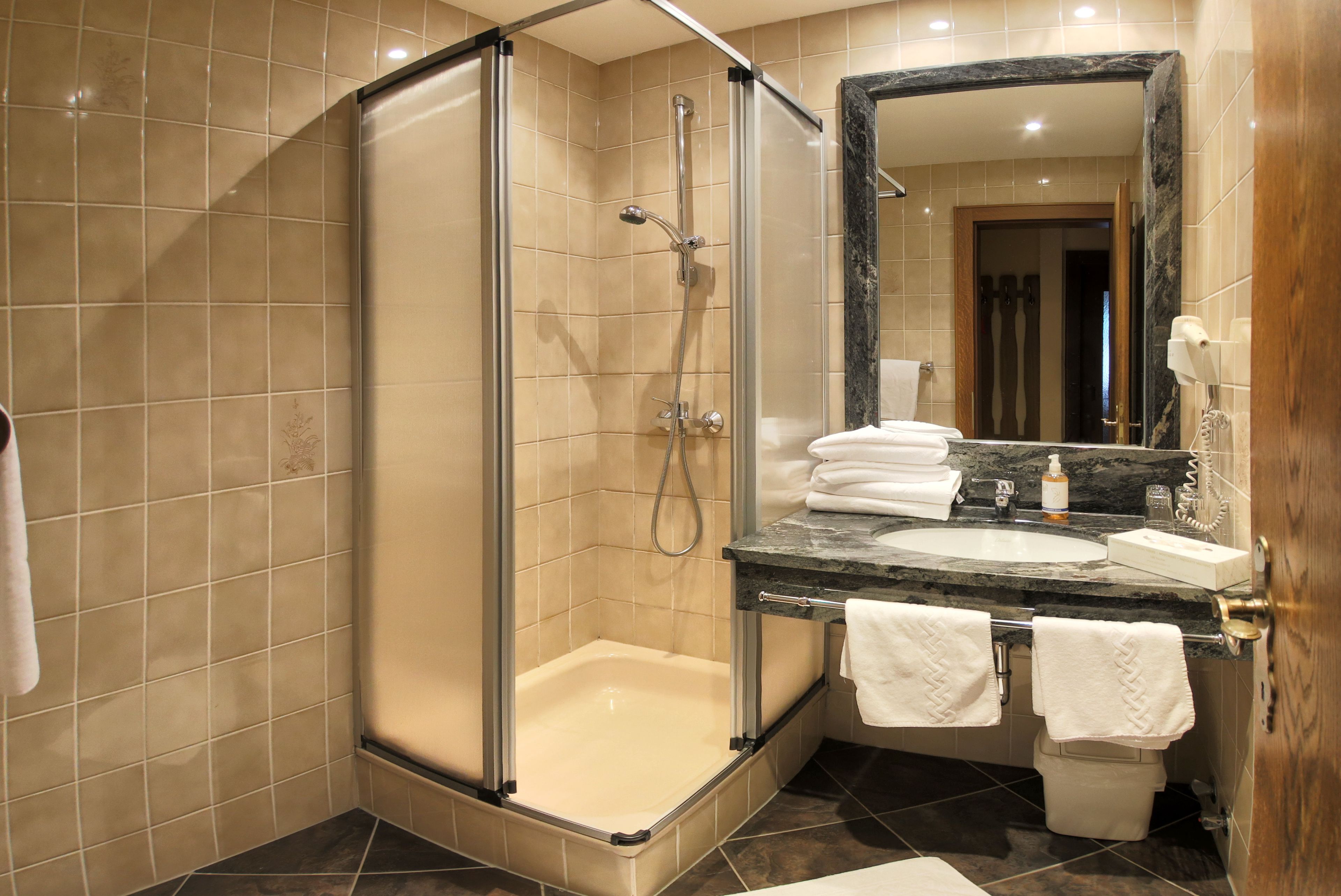 apartment, balcony, mountain view | bathroom | deep-soaking bathtub, free toiletries, hair dryer, bathrobes