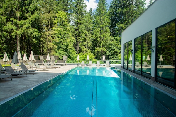 Indoor pool, outdoor pool, pool umbrellas, sun loungers