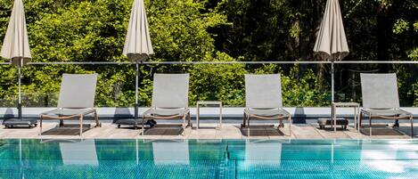 Indoor pool, outdoor pool, pool umbrellas, sun loungers