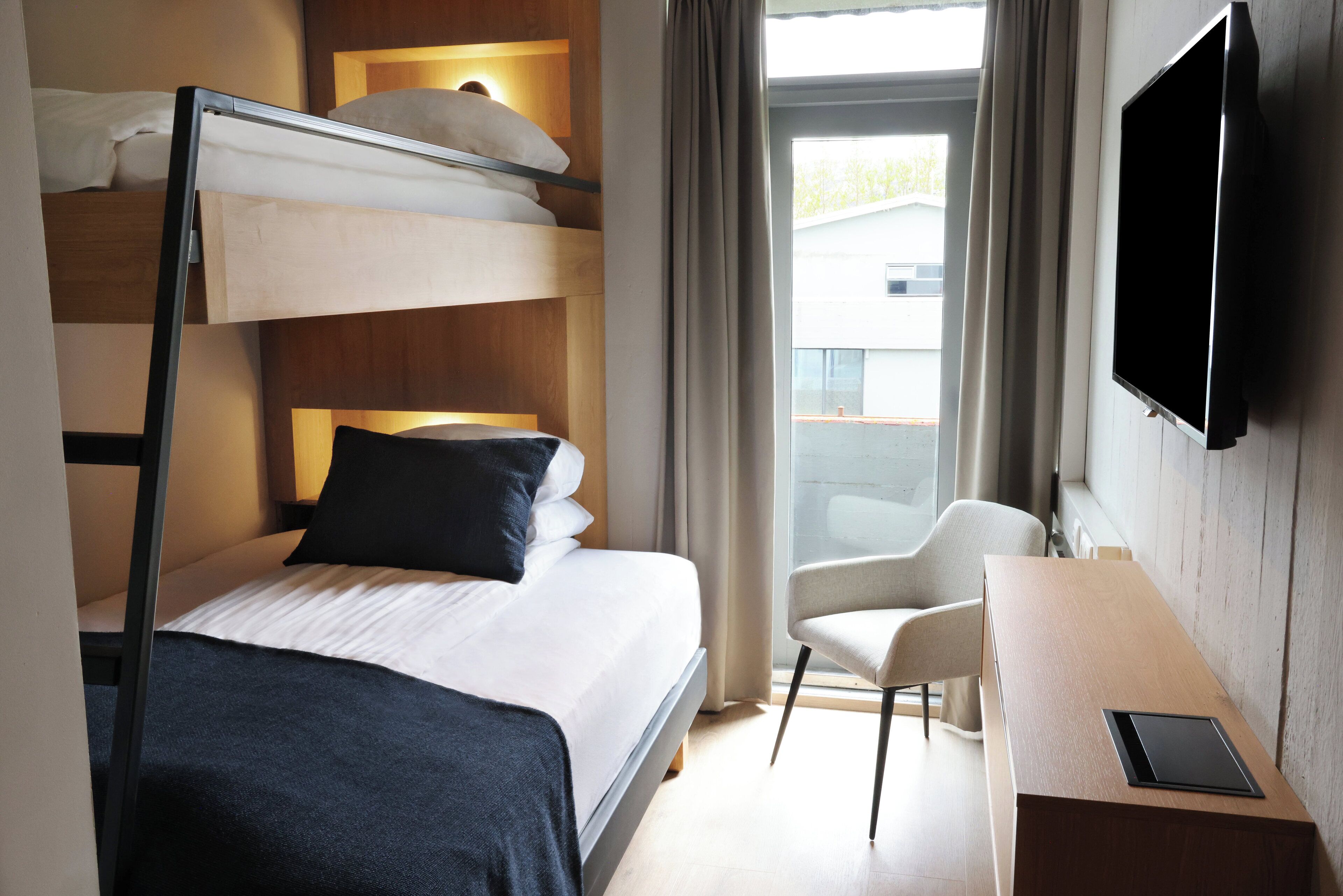 family room, 2 bedrooms | in-room safe, blackout curtains, free wifi, bed sheets