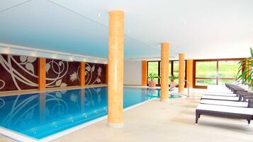 Indoor pool, open 7 AM to 8 PM, pool loungers