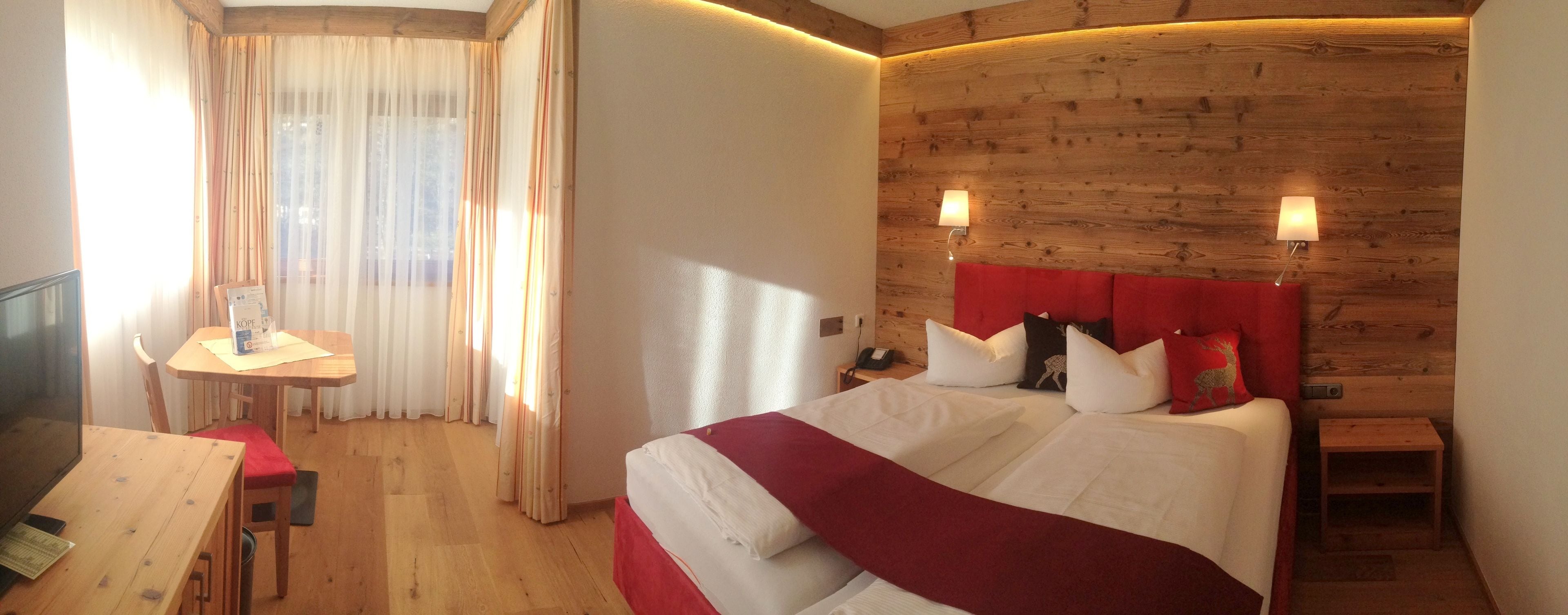 hypo-allergenic bedding, in-room safe, desk, blackout curtains