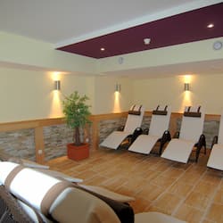 Sauna, steam room, body treatments, hot stone massages, sports massages
