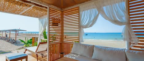 Private beach, sun loungers, beach umbrellas, beach towels