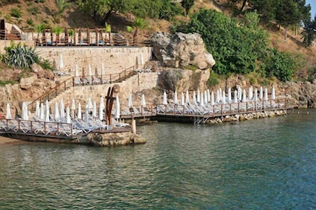 Private beach nearby, sun loungers, beach umbrellas