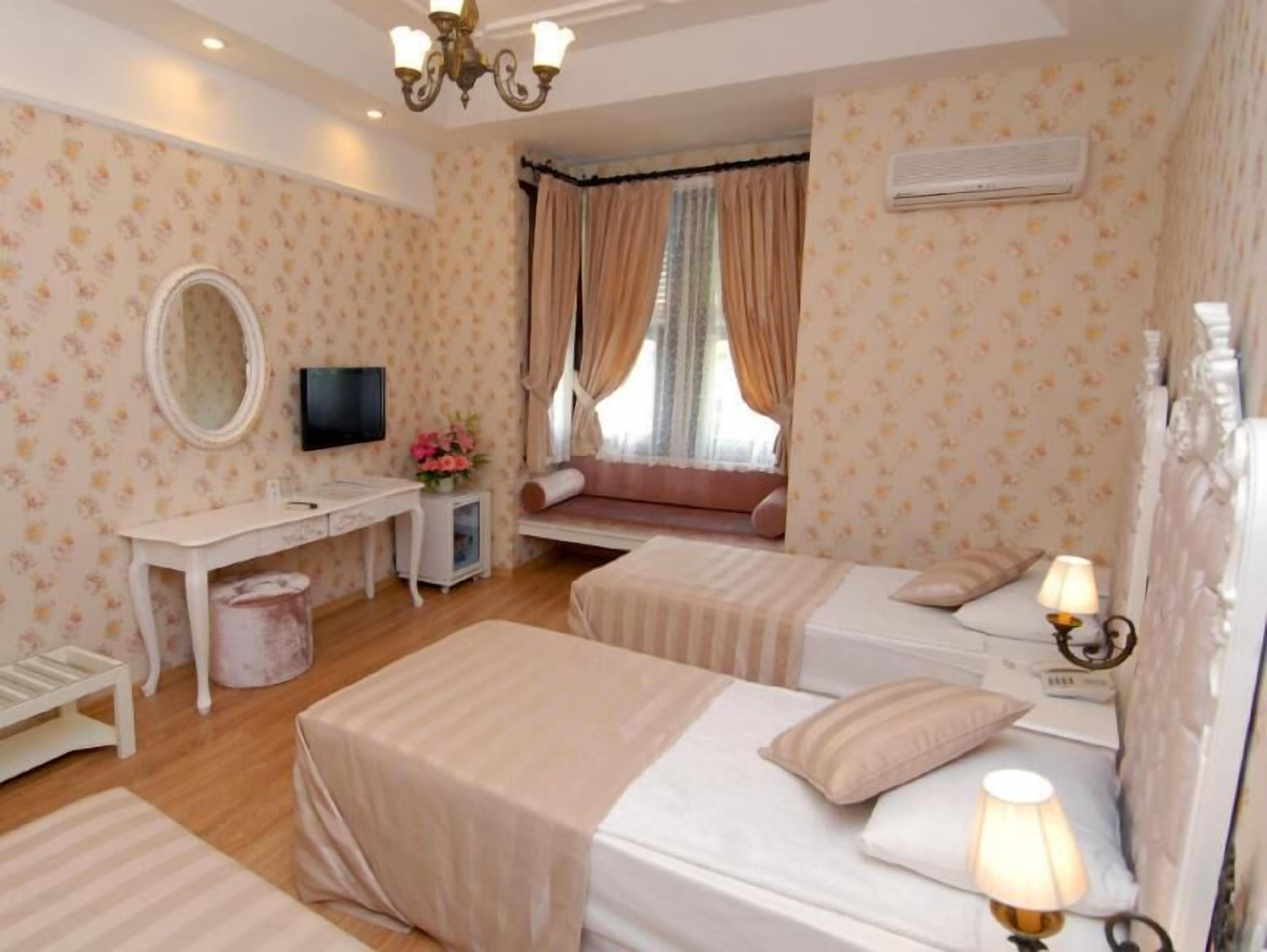 Minibar, safe på rommet, individuelt dekorert og individuelt innredet