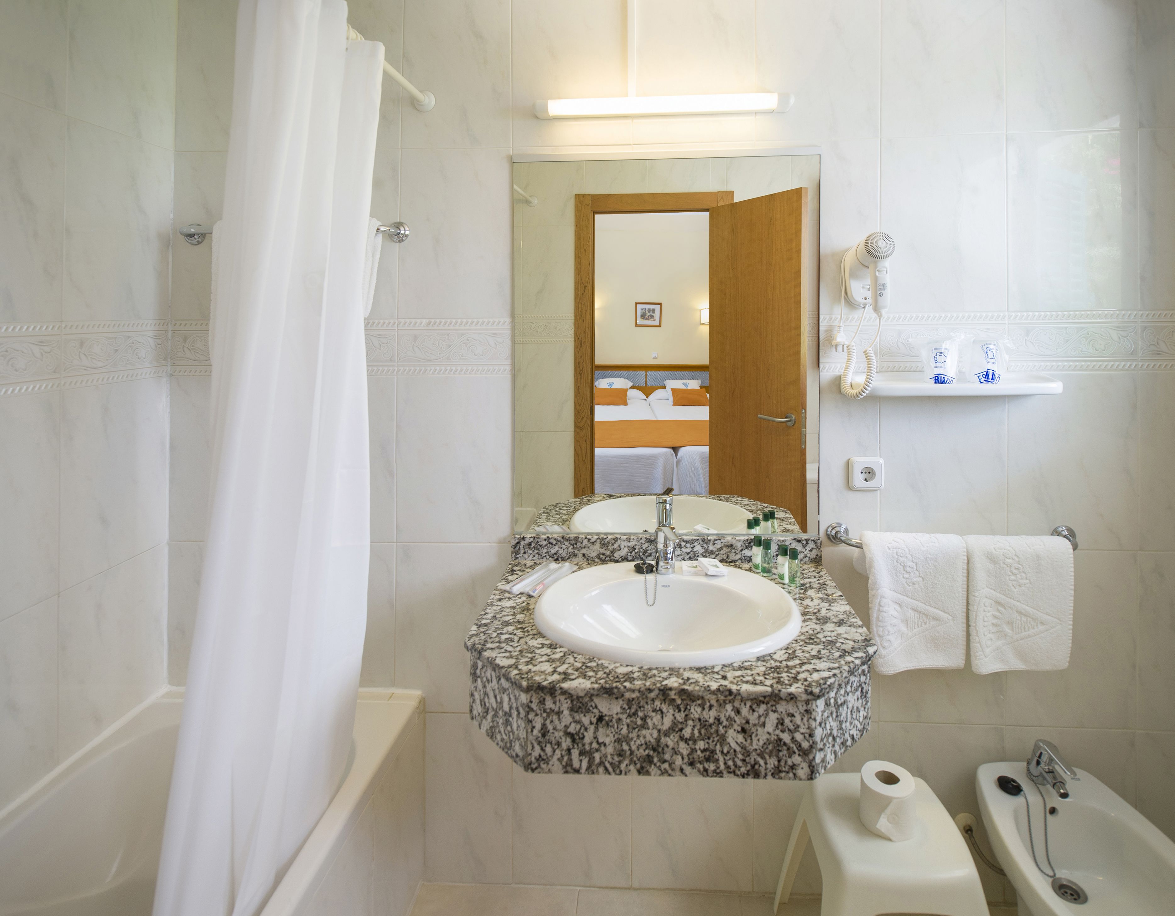 double or twin room, balcony, garden view | bathroom | hair dryer, towels