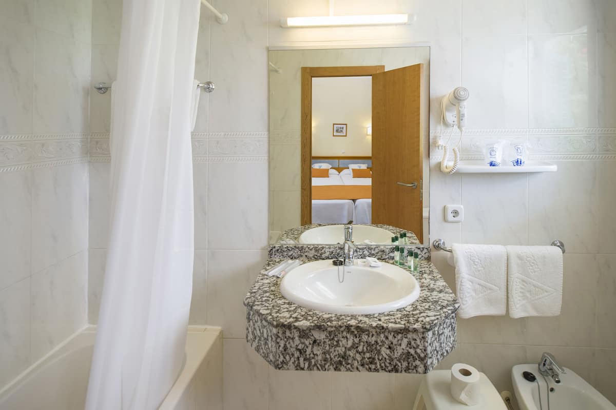 double or twin room, balcony, garden view | bathroom | hair dryer, towels