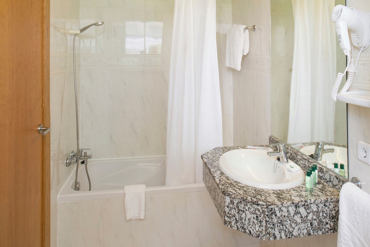 Bathroom | Hair dryer, towels