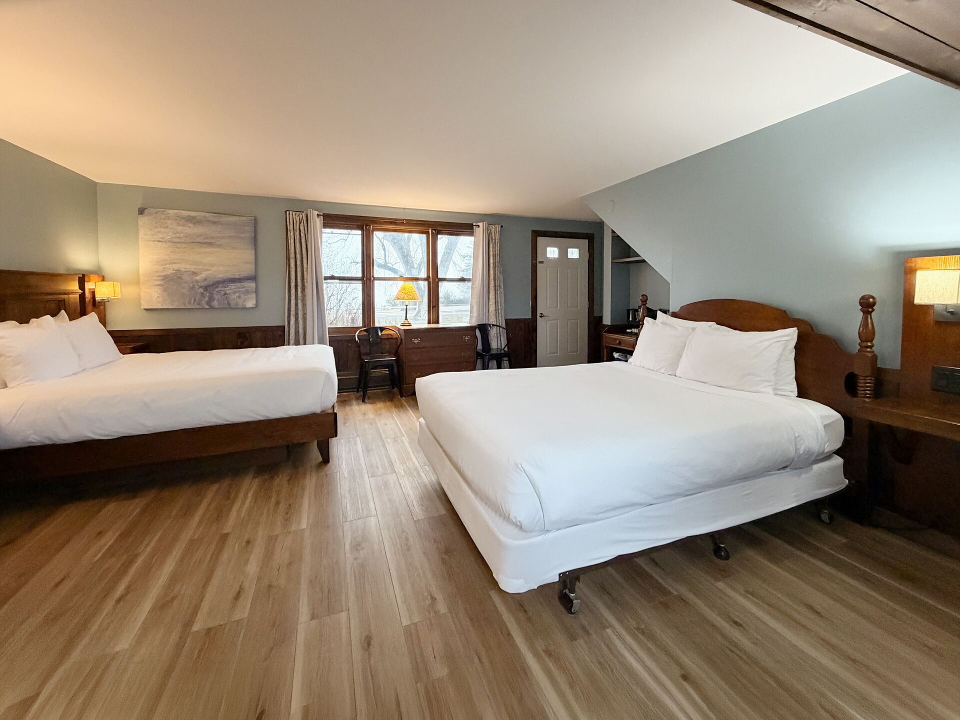 Double Queen | Premium bedding, down comforters, individually decorated