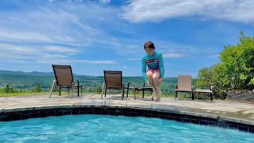 Outdoor pool, open 7:00 AM to 9:00 PM, sun loungers