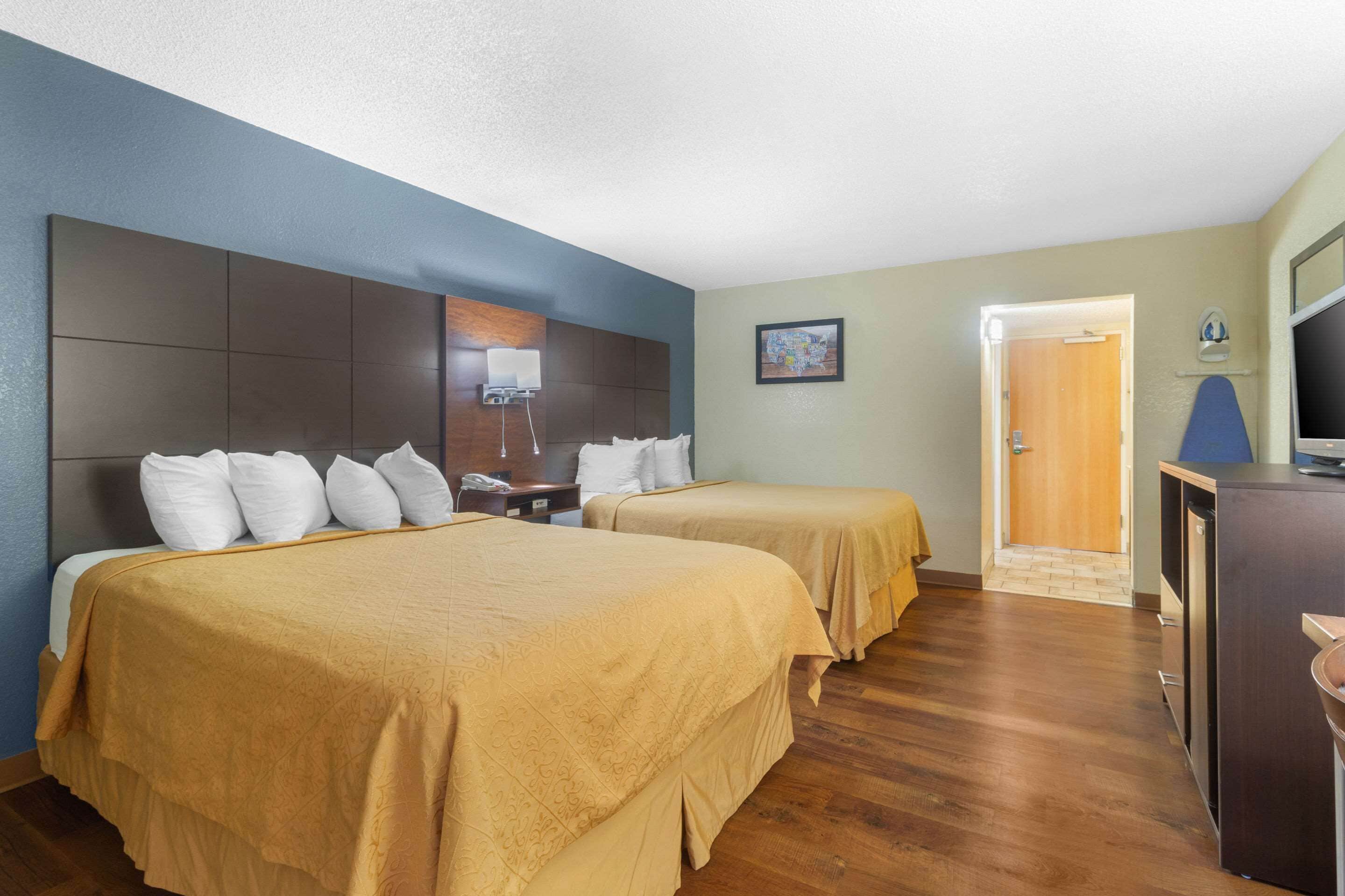 standard room, 2 queen beds, non smoking | iron/ironing board, free wifi, bed sheets, alarm clocks