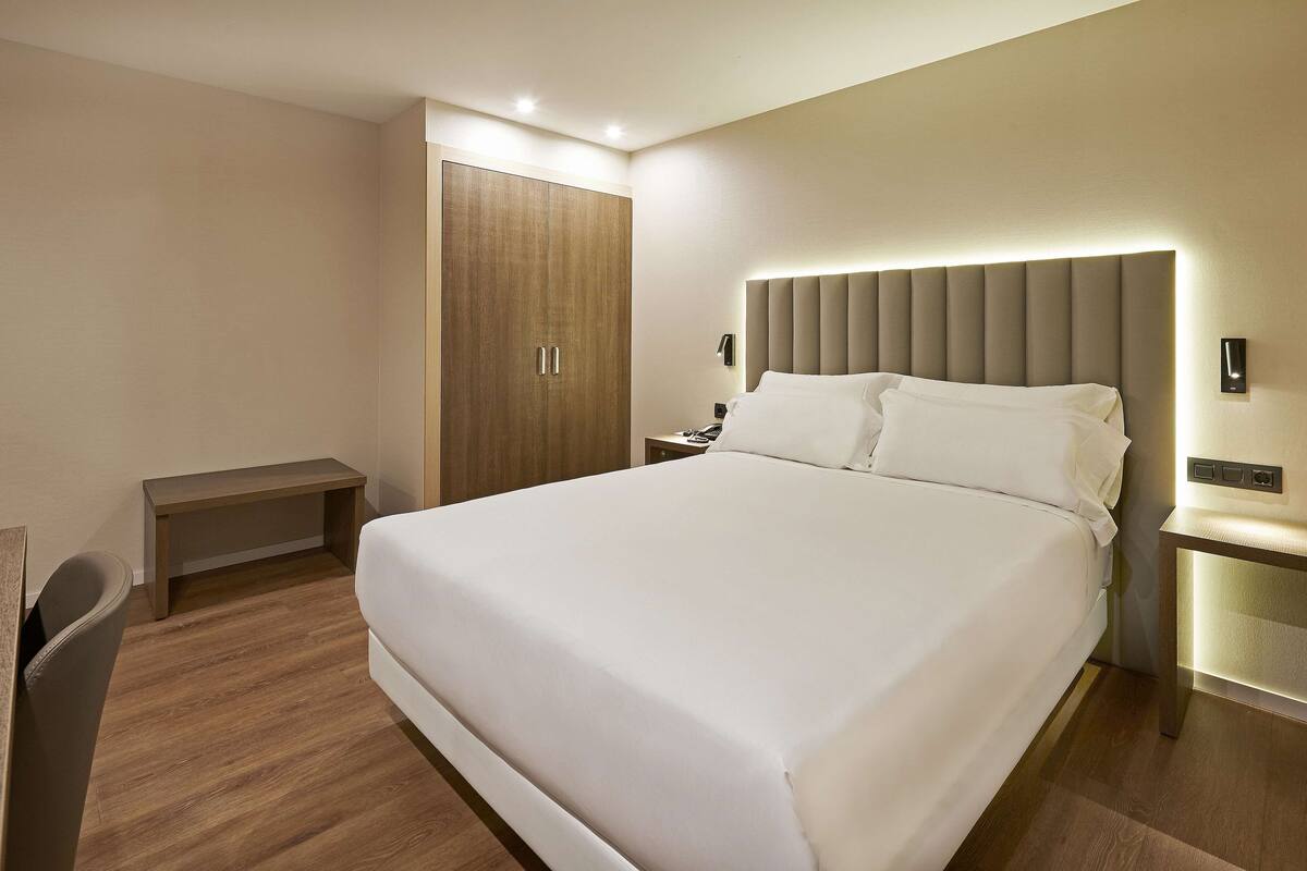 Phòng 4 dành cho gia đình | Bộ đồ giường cao cấp, chăn bông, minibar, két bảo mật tại phòng 