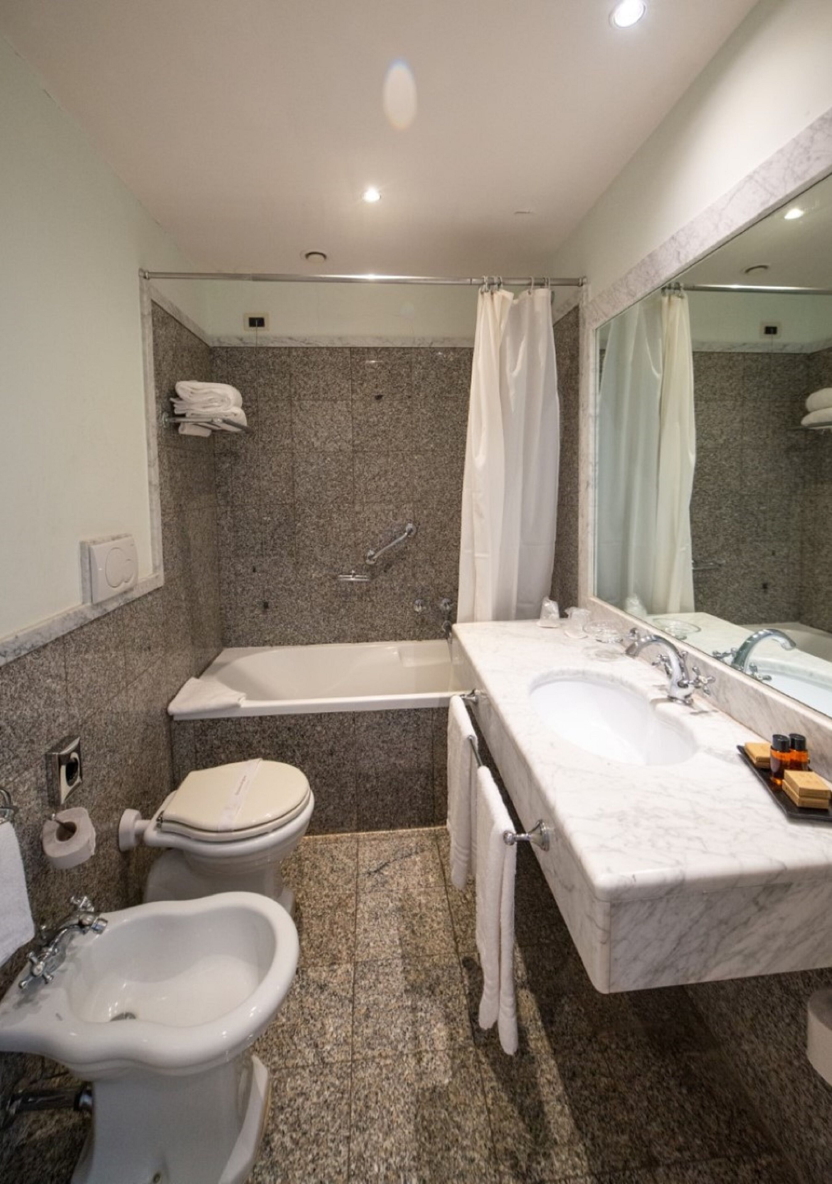 classic double or twin room | bathroom | hair dryer, bidet, towels