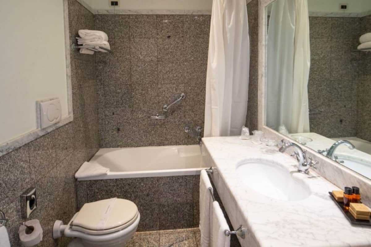classic double or twin room | bathroom | hair dryer, bidet, towels