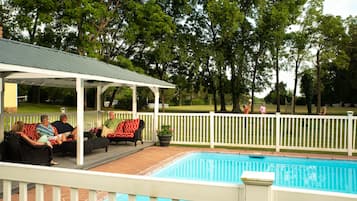 Seasonal outdoor pool, pool umbrellas, sun loungers