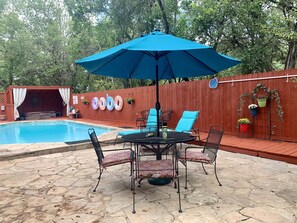 Seasonal outdoor pool, pool loungers