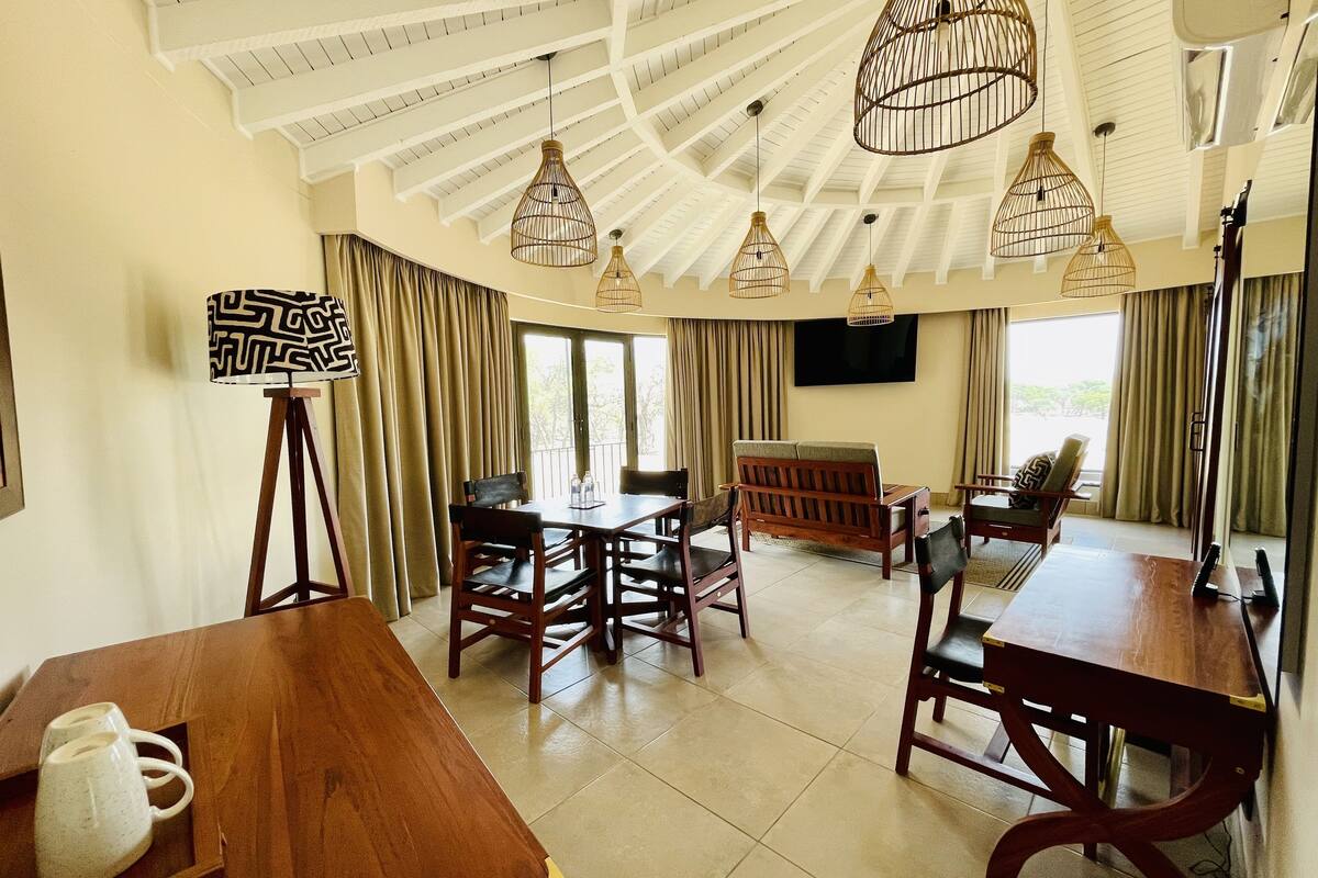 executive suite room | living area | led tv