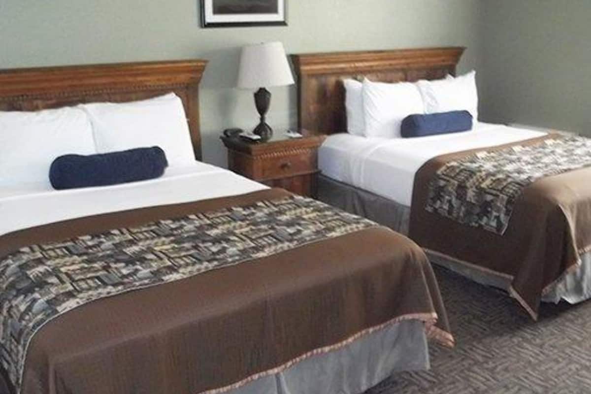 room, 2 double beds, non smoking | blackout curtains, iron/ironing board, free cots/infant beds, free wifi