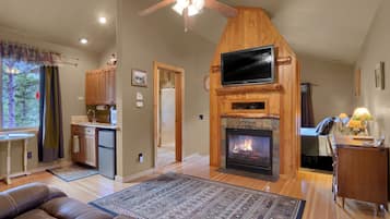 Luxury Cabin, 1 King Bed, Hot Tub, Mountain View | Living area | 42-inch flat-screen TV with cable channels, TV, fireplace