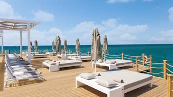 Private beach, beach cabanas, sun loungers, beach umbrellas