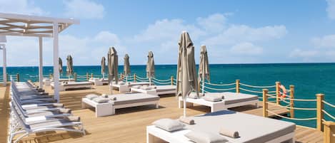 Private beach, beach cabanas, sun-loungers, beach umbrellas