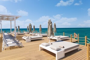 Private beach, beach cabanas, sun-loungers, beach umbrellas