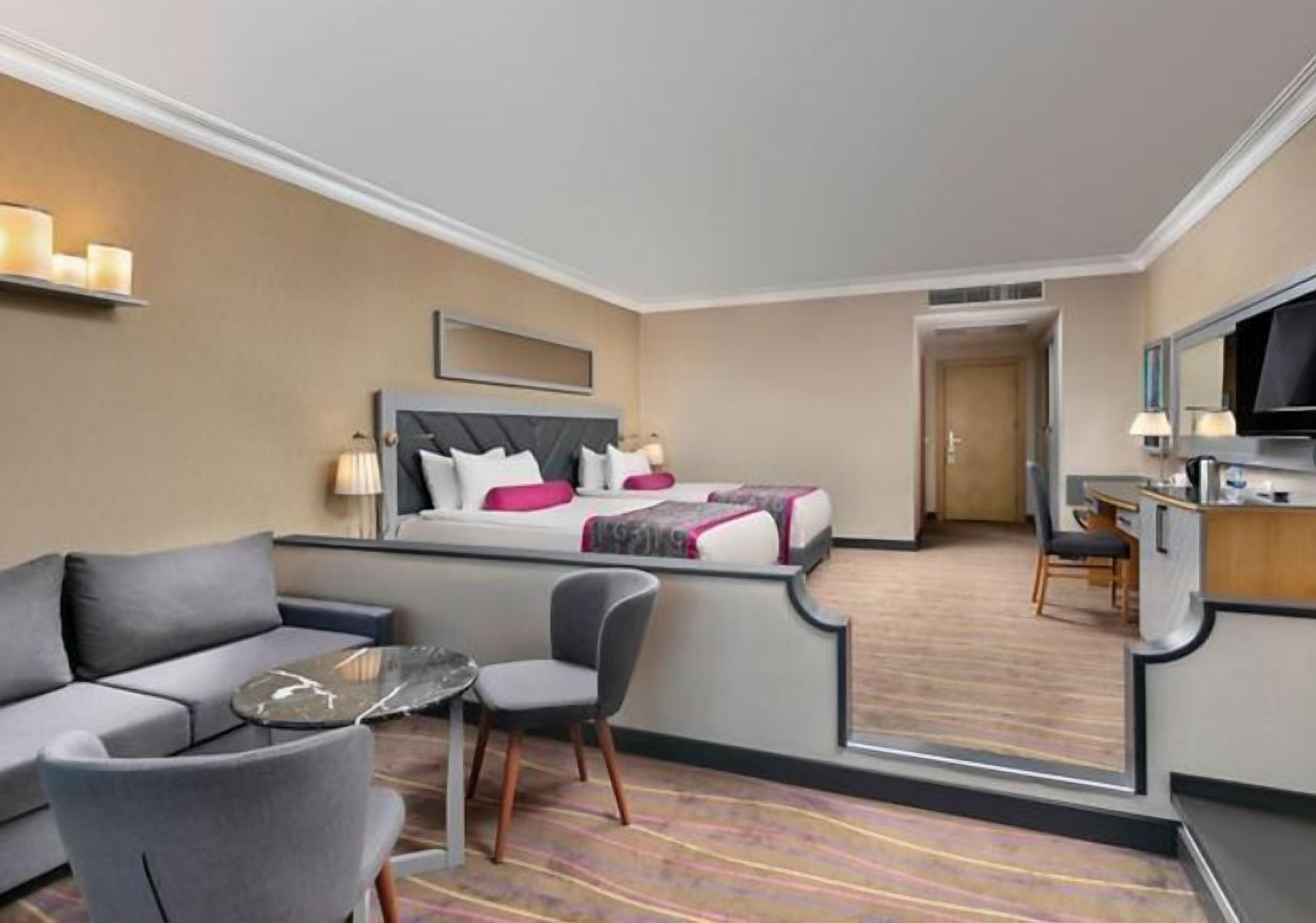 Free minibar items, in-room safe, laptop workspace, blackout drapes