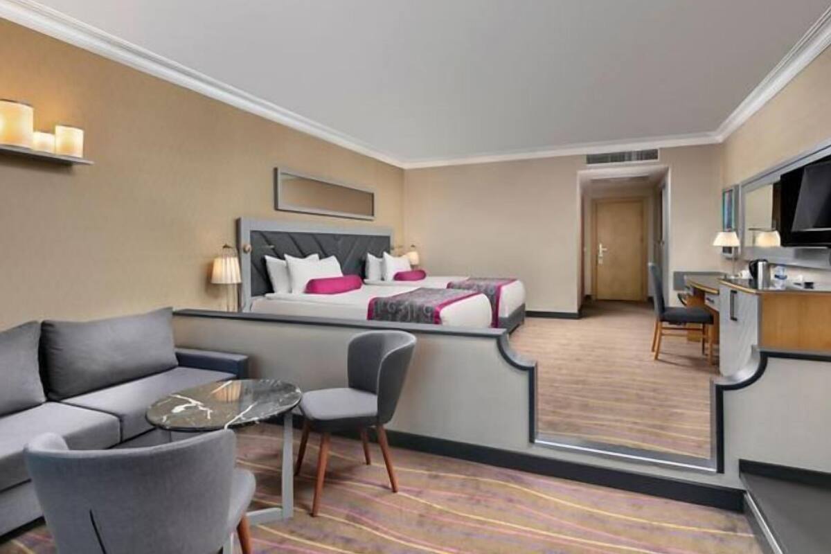 Free minibar items, in-room safe, laptop workspace, blackout drapes