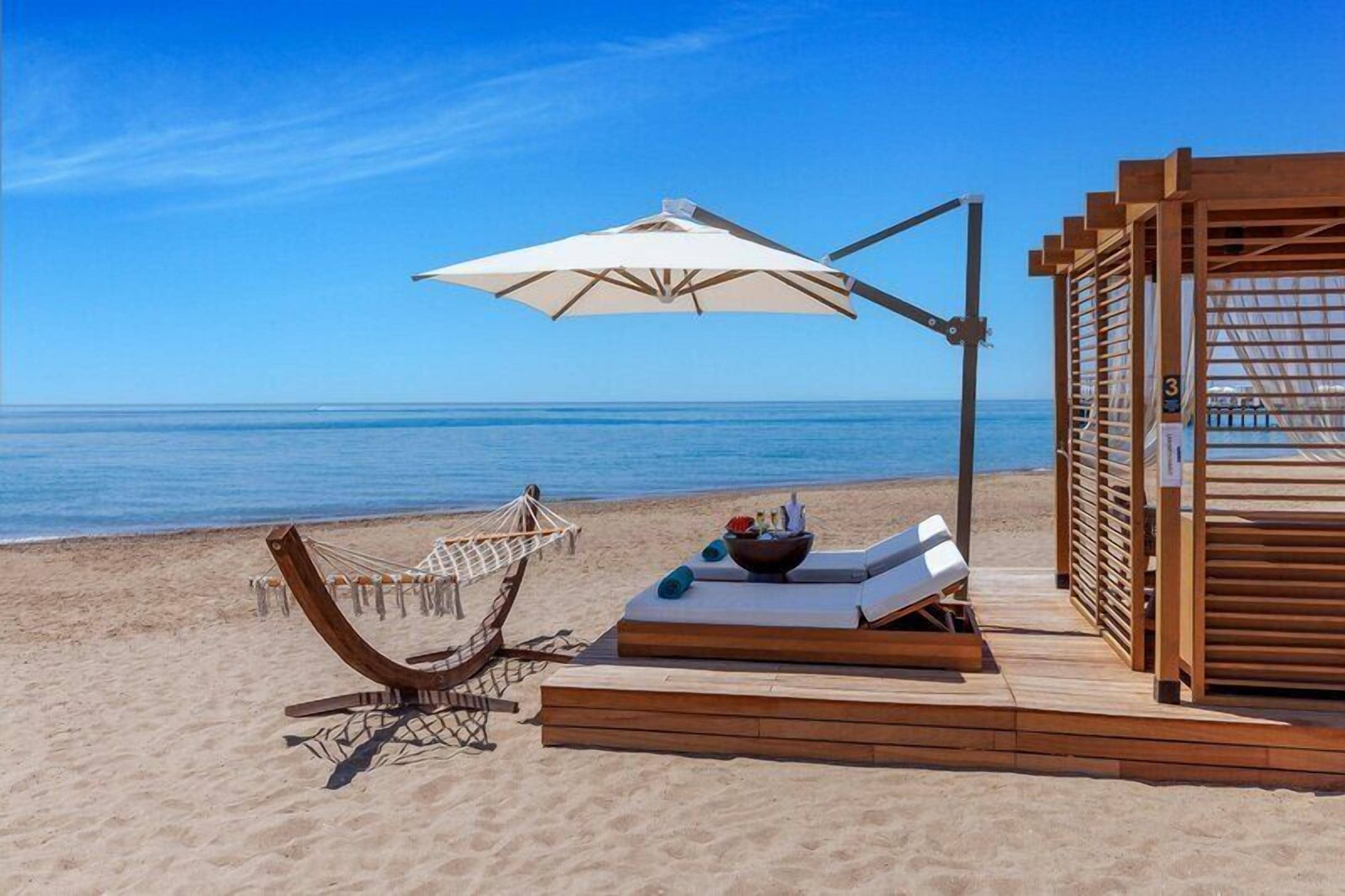 Private beach, beach cabanas, sun-loungers, beach umbrellas