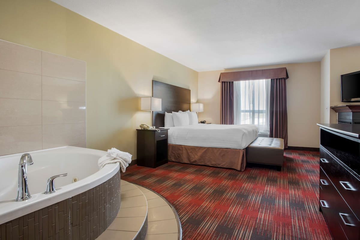 Premium bedding, down duvets, pillow-top beds, in-room safe