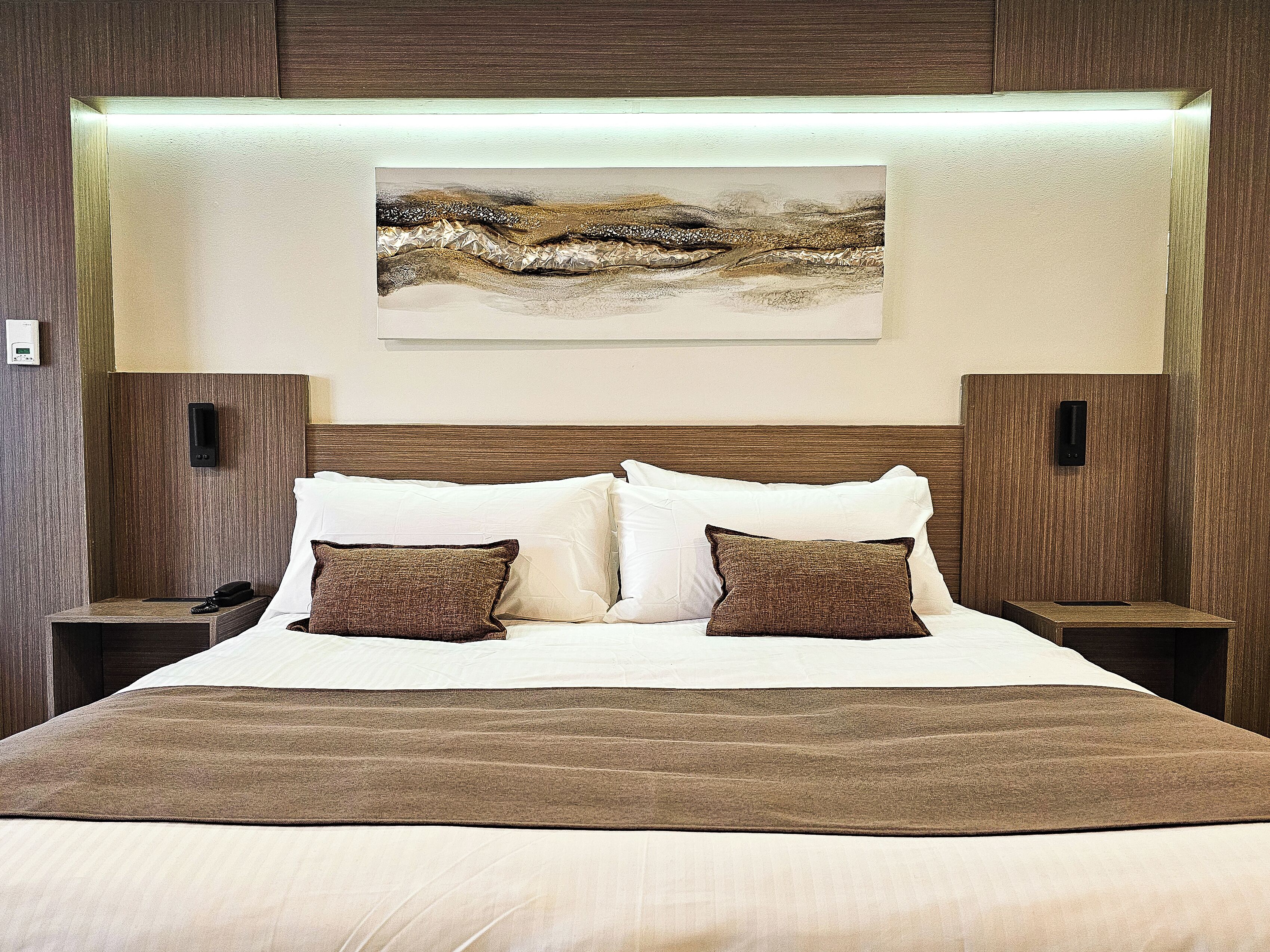 deluxe studio, 1 king bed with sofa bed, pets not allowed | premium bedding, blackout curtains, iron/ironing board, cots/infant beds