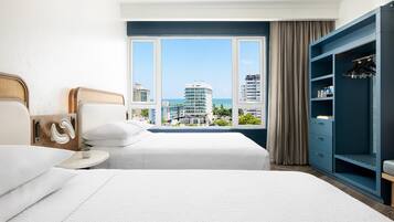 Room, 2 Queen Beds, Pool View | In-room safe, individually decorated, individually furnished