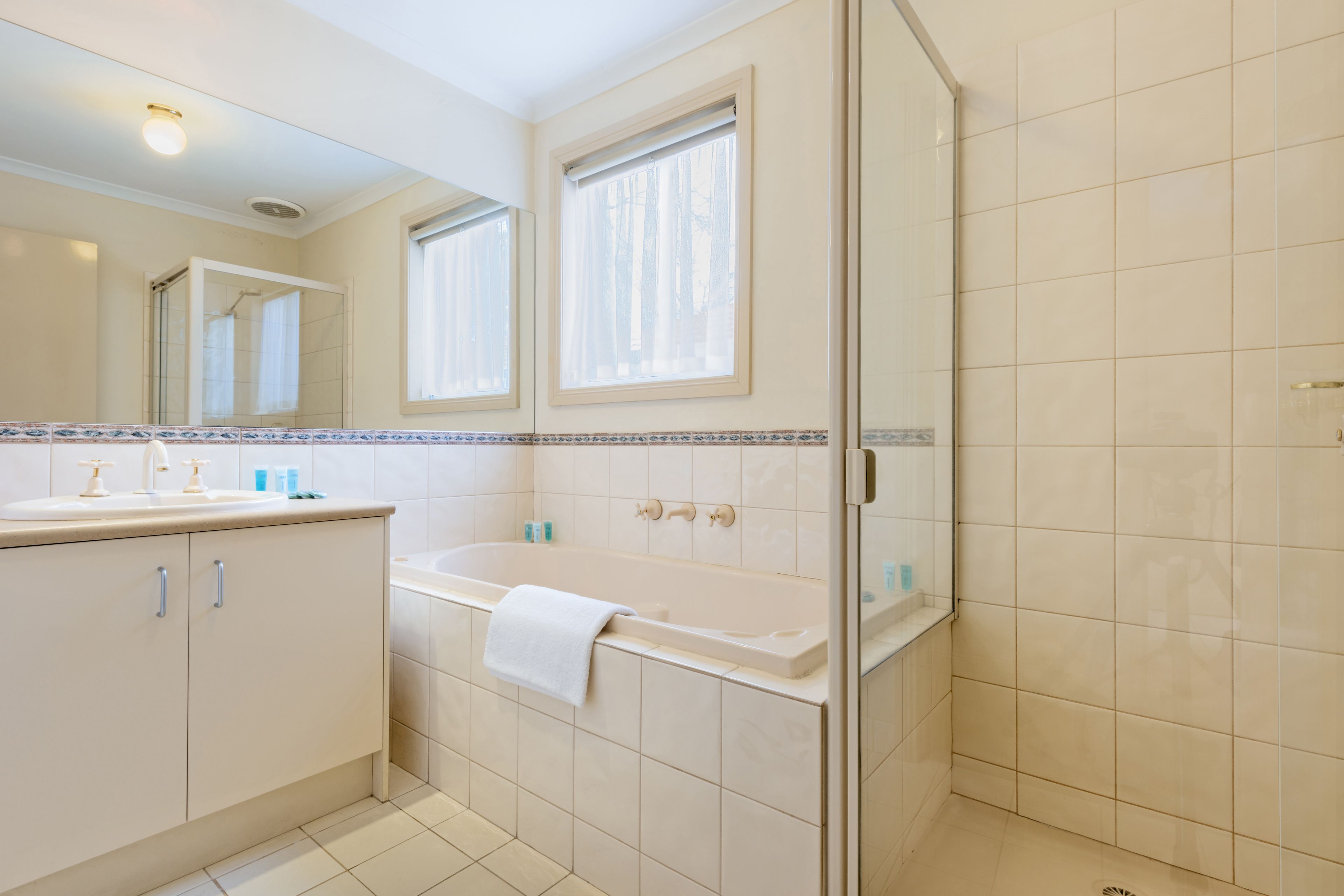 Separate bathtub and shower, free toiletries, hair dryer, towels
