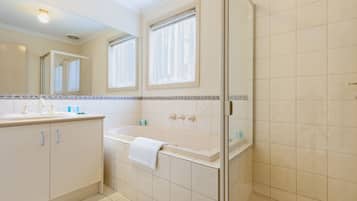 Separate bathtub and shower, free toiletries, hair dryer, towels