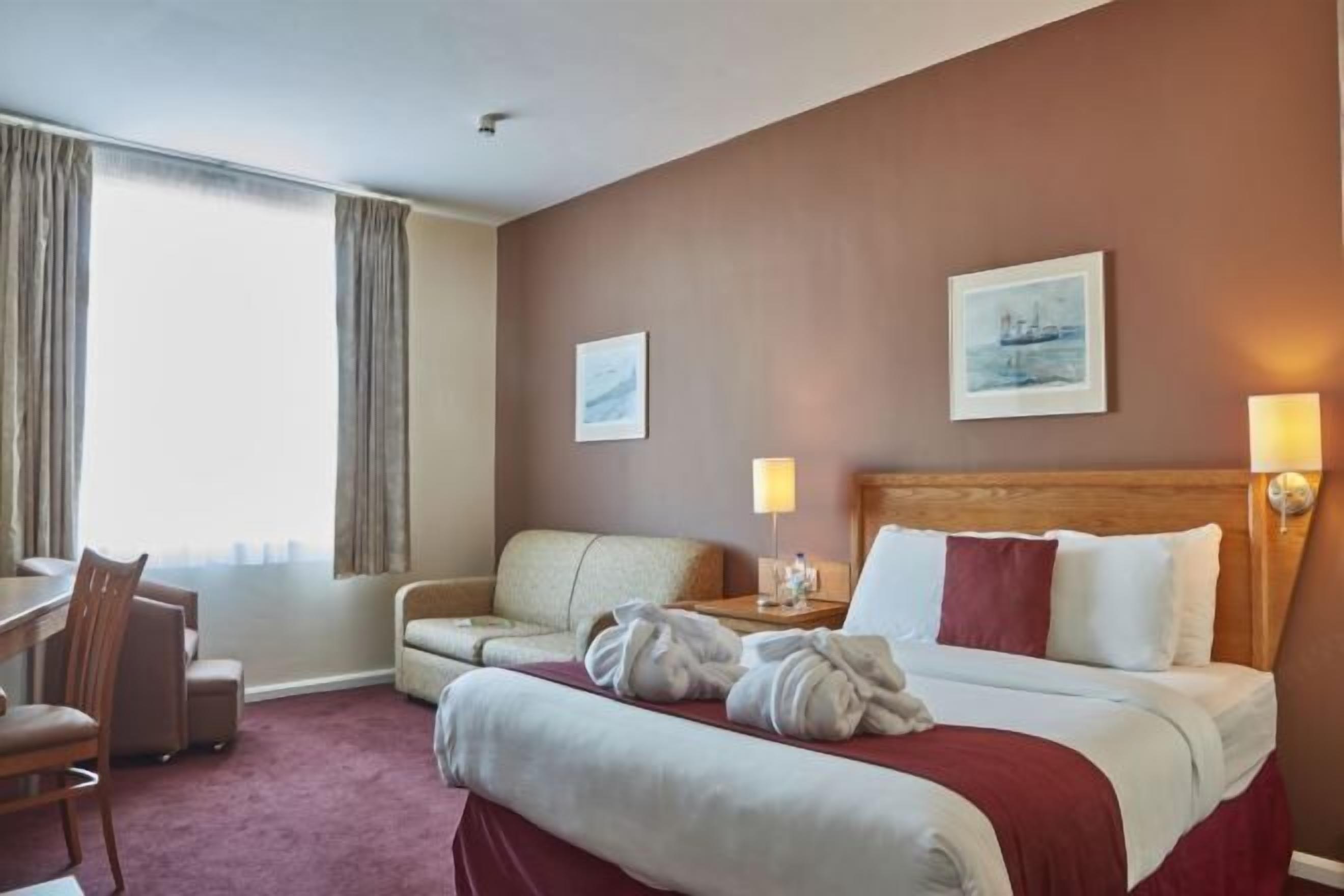 In-room safe, desk, blackout curtains, iron/ironing board