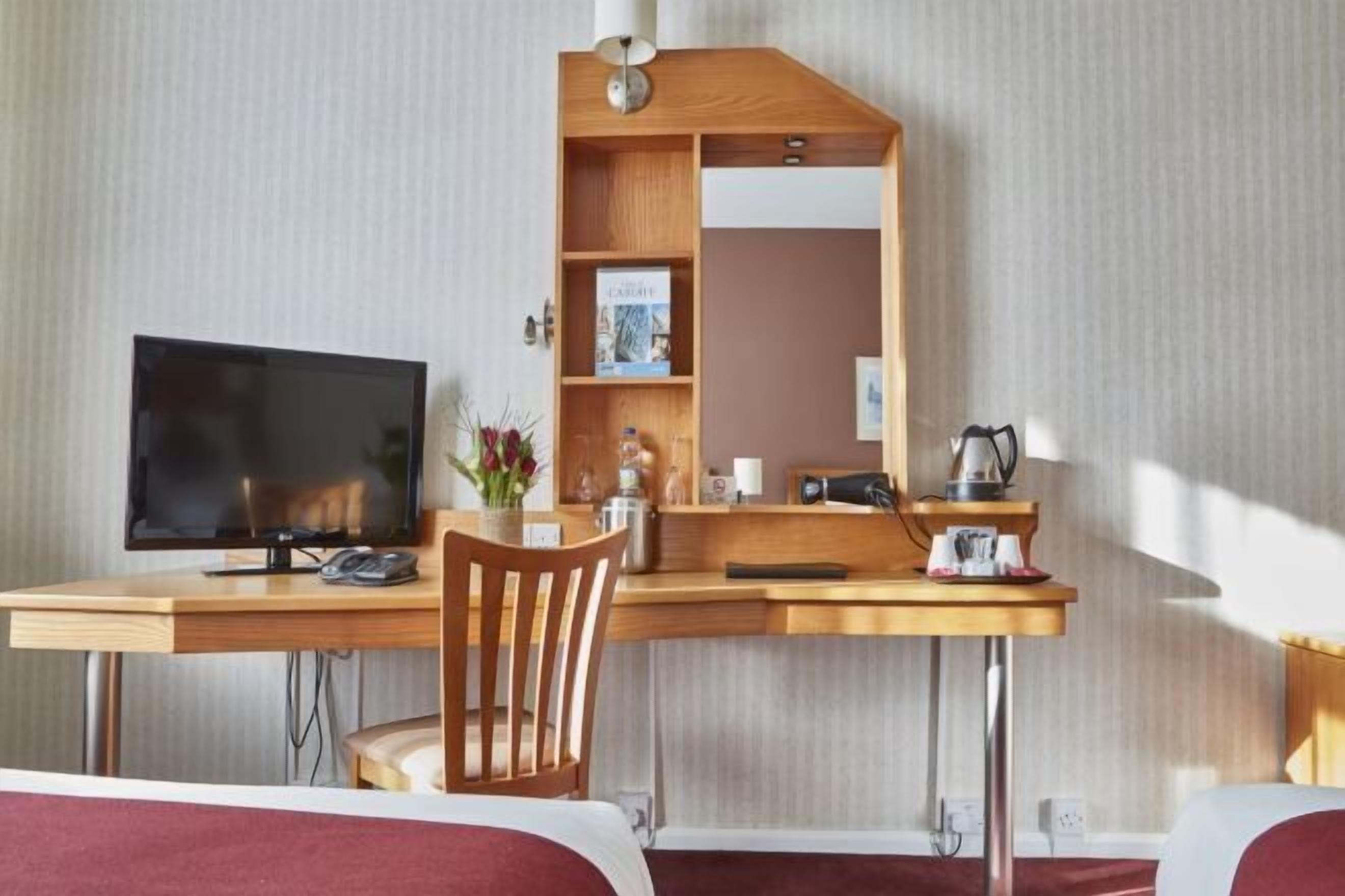In-room safe, desk, blackout curtains, iron/ironing board