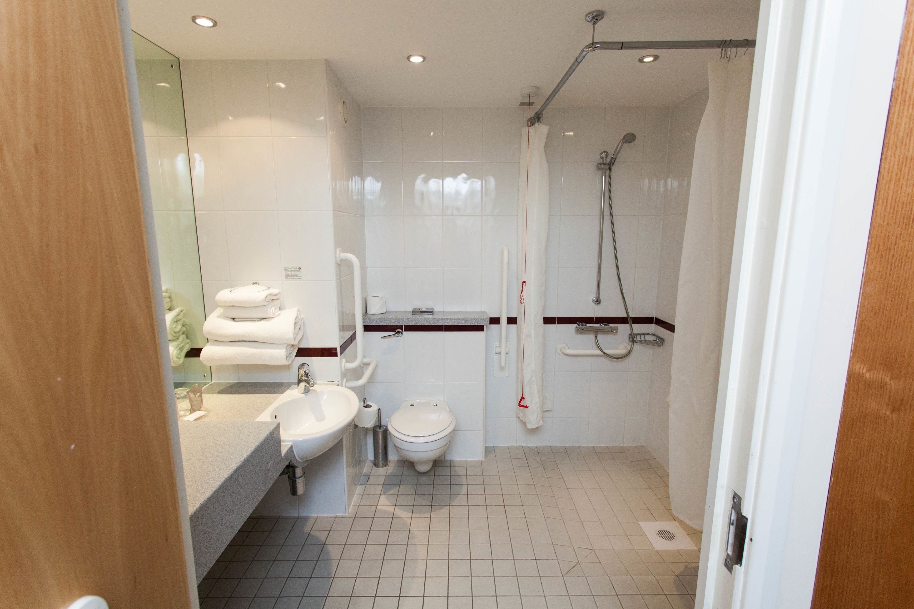 combined shower/bathtub, free toiletries, hair dryer, bathrobes